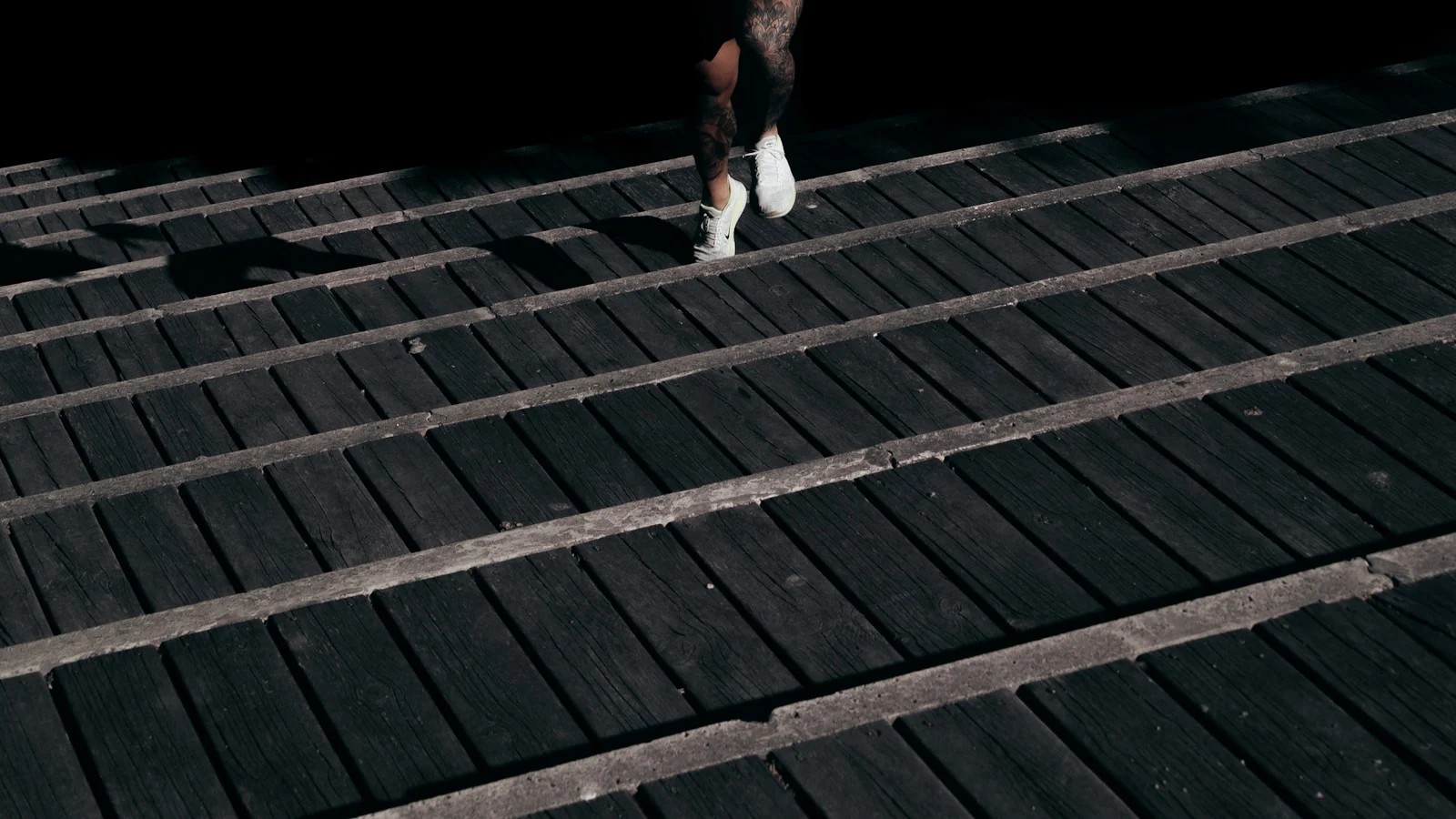 Runner climbing dark stairs as a metaphor for researching retatrutide carefully instead of chasing hype